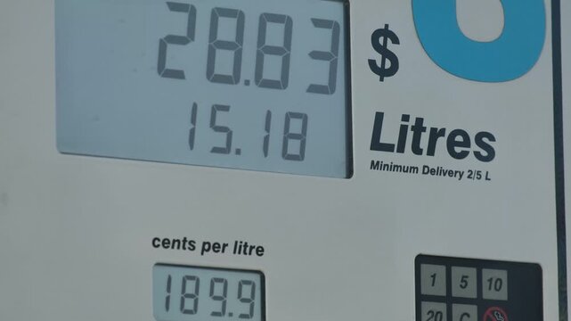 A fuel pump digital display showing the price and litres increasing in real time while refuelling a vehicle in Australia, a unit price of 189.9 cents per litre displayed below.