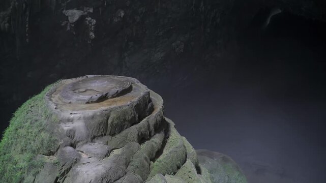 panning camera from left to right to show the iconic formation of Son Doong and dark cave inside