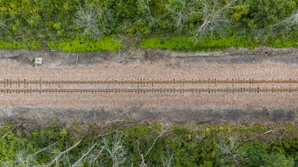 Fototapeta premium An aerial perspective looking straight down at a railroad track.