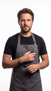 Stylish Barber with Scissors and Comb: A handsome barber with a beard and apron stands confidently, holding professional grooming tools, ready to craft a perfect haircut.