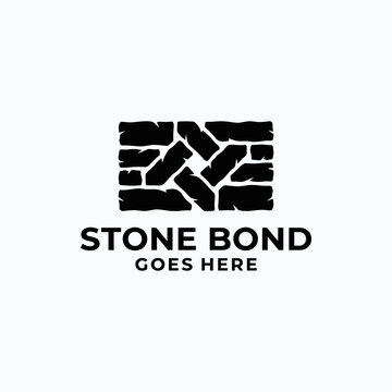 Interlocking stone block pattern logo for masonry.