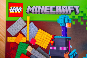 Fototapeta premium LEGO Minecraft box, multicolored plastic bricks, Colorful toy set, building blocks, development fine motor skills, play time, creative activity product detail, brand identity, creating something new