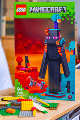 Fototapeta premium LEGO Minecraft box, multicolored plastic bricks, Colorful toy set, building blocks, development fine motor skills, play time, creative activity product detail, brand identity, creating something new