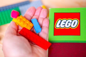 Fototapeta premium LEGO Minecraft box, multicolored plastic bricks, Colorful toy set, building blocks, development fine motor skills, play time, creative activity product detail, brand identity, creating something new