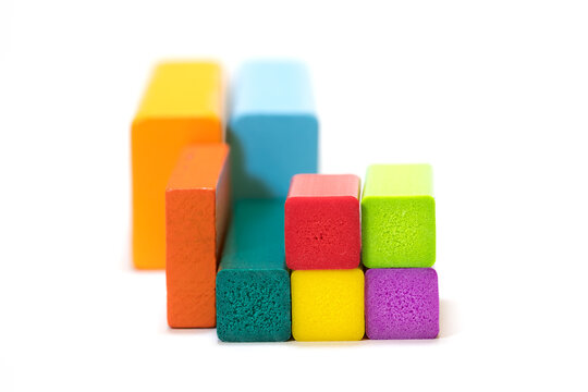 Colorful wooden building blocks creating abstract structure