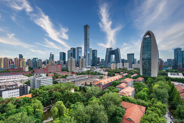 Obraz premium Slow shutter speed, flowing clouds, Beijing CBD skyline, green and eco-friendly metropolis