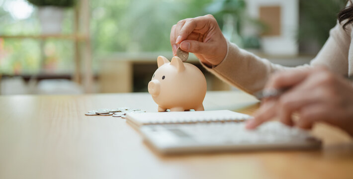 piggy bank savings, coin deposit, and calculator shape this practical household finance scene. It conveys practical choices, organized planning, everyday money management, and financial awareness.