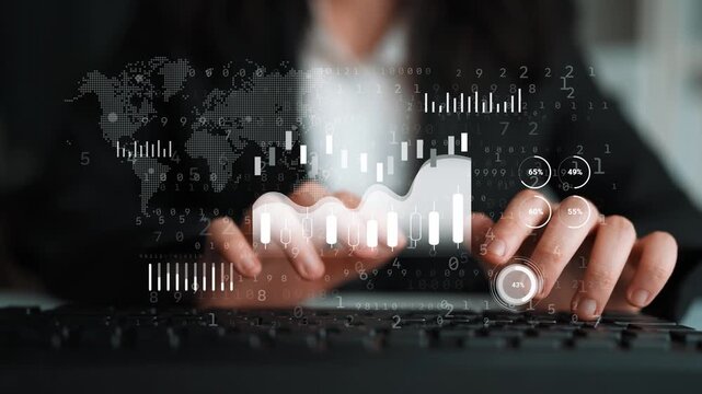 Business Professional Using Laptop with Digital Financial Graphs and Data Visualization Overlays in Modern Office Environment. Entropy.