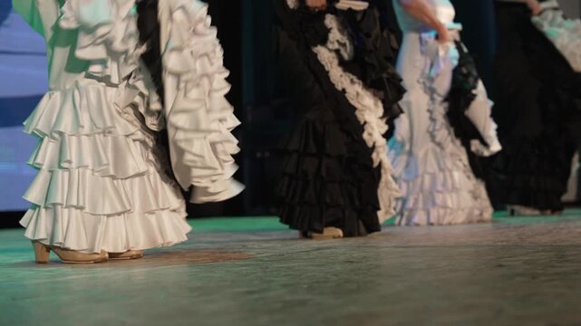 Flamenco dancing in spanish Bata de Cola dress 