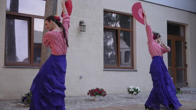 Flamenco woman. Fan used in flamenco dance