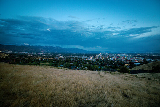 Post Storm Sunset View of Salt Lake City Skyline and Utah State Capitol from Ensign Peak with Wasatch Mountains in Summer