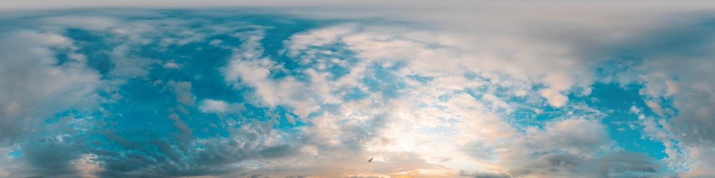 Sunset sky panorama with bright glowing pink Cumulus clouds. HDR 360 seamless spherical panorama. Full zenith or sky dome in 3D, sky replacement for aerial drone panoramas. Climate and weather change.