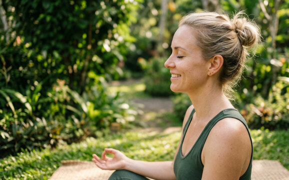 Morning sunlight creates a warm atmosphere during a calming yoga practice session.
