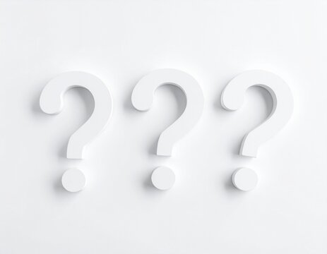 Three white question marks symbol on white floor flat lay top view from above with copy space, question, faq or brainstorming concept