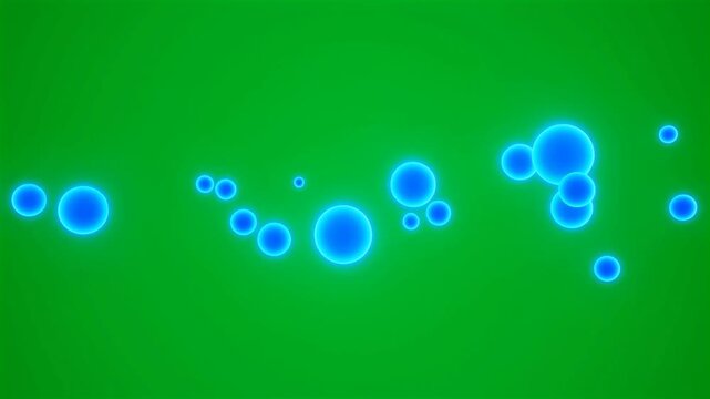 Animated glowing blue circular particles floating on a green screen HD video for video editing