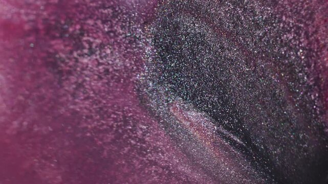 Emulsion leaking. Ink water. Defocused purple silver color texture glitter flow floating on abstract creative acrylic art background.