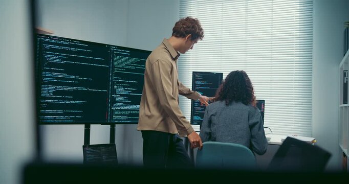 Diverse team software developer discuss AI coding and project strategy at office. Creative startup group brainstorming, Mentor code review training, Digital communication innovation strategy concept.