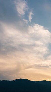 Beautiful evening clouds time-lapse, soft purple and pink sky background.