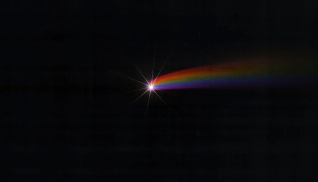 A vibrant comet or shooting star featuring a glowing light effect with a colorful trail against a dark black background