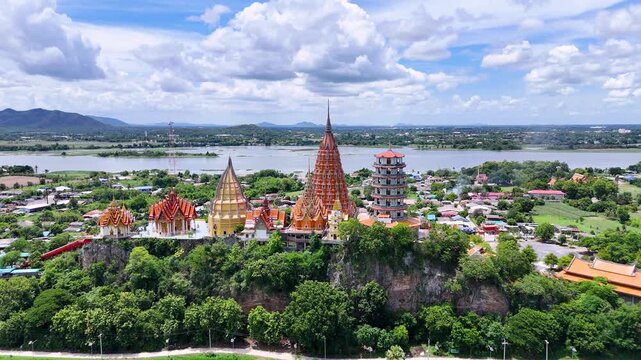 Drone shot of Wat Tham Suea temple on a hill in Kanchanaburi Thailand