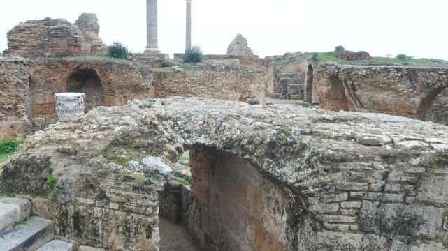 Panorama: ancient ruins of Carthage archaeological site overlooking Mediterranean Sea in Tunis Governorate Tunisia under overcast sky