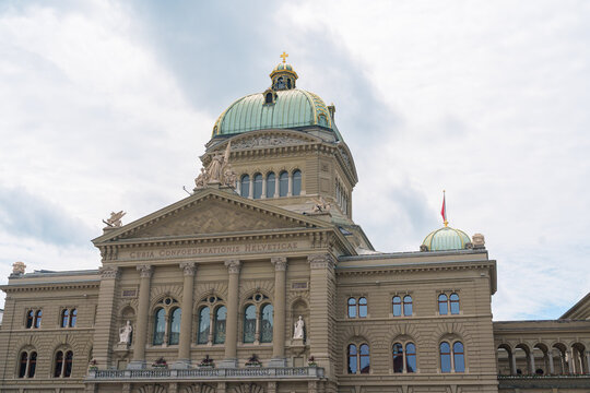Curia Confoederationis Helveticae Latin phrase on Federal Palace Bundeshaus in Bern, Switzerland. Origin of Swiss country code CH, famous historical monument and parliament building facade