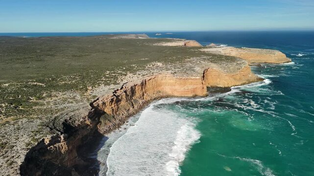 Ethel Beach, Dhilba Guuranda-Innes National Park, South Australia &ndash; 4K aerial drone view of sandy beach, dramatic limestone cliffs, turquoise ocean and rugged Yorke Peninsula coastline