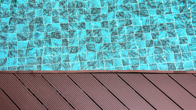 An abstract overhead view of the clear blue water of a swimming pool with mosaic tiles and wooden decking. A minimalist backdrop suitable for relaxation, travel, spa, and summer design themes.