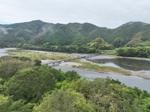 Aerial View of Sada Chinka Bridge over the Shimanto River on a Cloudy Early Summer Morning, Kochi, Japan