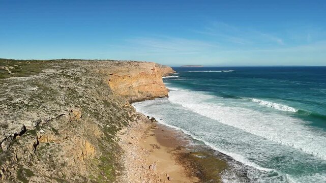 Ethel Beach, Dhilba Guuranda-Innes National Park, South Australia &ndash; 4K aerial drone view of sandy beach, dramatic limestone cliffs, turquoise ocean and rugged Yorke Peninsula coastline