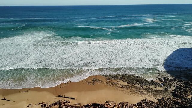 Ethel Beach, Dhilba Guuranda-Innes National Park, South Australia &ndash; 4K aerial drone view of sandy beach, dramatic limestone cliffs, turquoise ocean and rugged Yorke Peninsula coastline