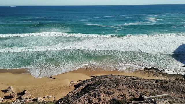 Ethel Beach, Dhilba Guuranda-Innes National Park, South Australia &ndash; 4K aerial drone view of sandy beach, dramatic limestone cliffs, turquoise ocean and rugged Yorke Peninsula coastline
