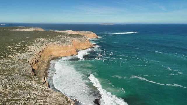 Ethel Beach, Dhilba Guuranda-Innes National Park, South Australia &ndash; 4K aerial drone view of sandy beach, dramatic limestone cliffs, turquoise ocean and rugged Yorke Peninsula coastline