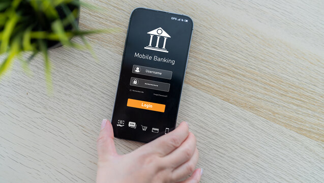 Businessman hand holding smartphone with online banking virtual interface, person using mobile phone for digital payment and financial transaction, fintech technology and internet security concept