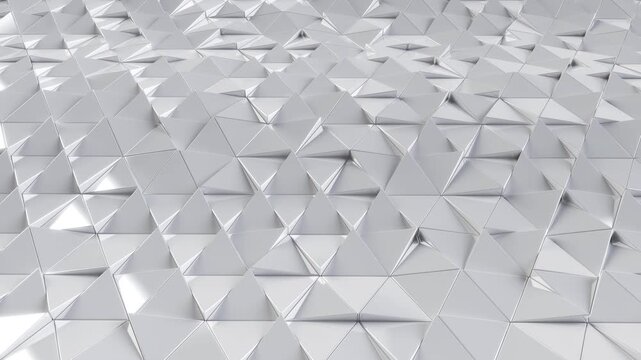 Abstract white and silver metallic low poly triangle surface moving in a smooth wave pattern. 3D render geometric low-poly background, seamless loopable animation.