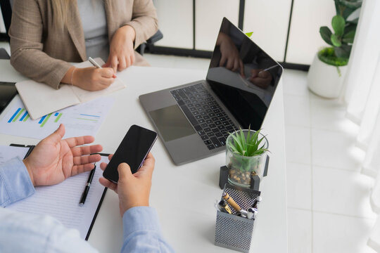 Asian business people vdo conferance on laptop in office