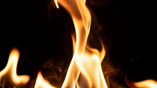 Mesmerizing flames flickering and swirling creating warm glowing firelight ambiance