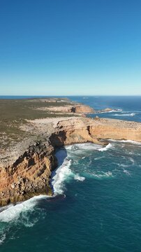 Ethel Beach, Dhilba Guuranda-Innes National Park, South Australia &ndash; 4K aerial drone footage of sandy beach, dramatic limestone cliffs, turquoise ocean and rugged Yorke Peninsula coastline