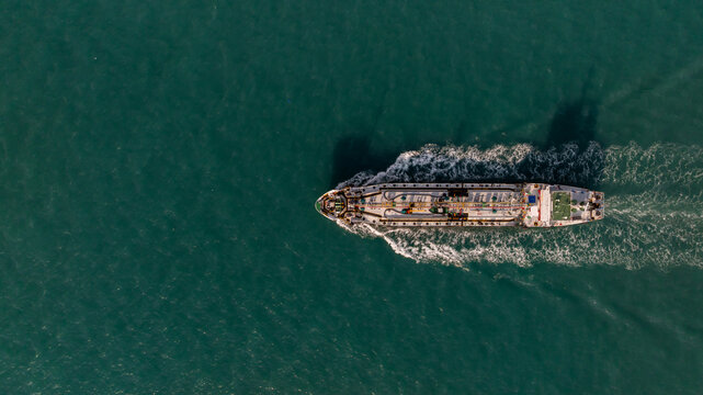 Aerial view oil tanker ship on sea, Oil tanker ship global business logistic and maritime transportation of petroleum petrochemical supply chain, Oil tanker ship  sailing on the sea.