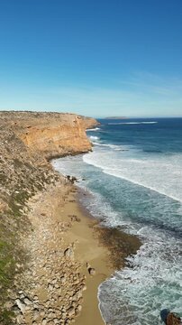 Ethel Beach, Dhilba Guuranda-Innes National Park, South Australia &ndash; 4K aerial drone footage of sandy beach, dramatic limestone cliffs, turquoise ocean and rugged Yorke Peninsula coastline