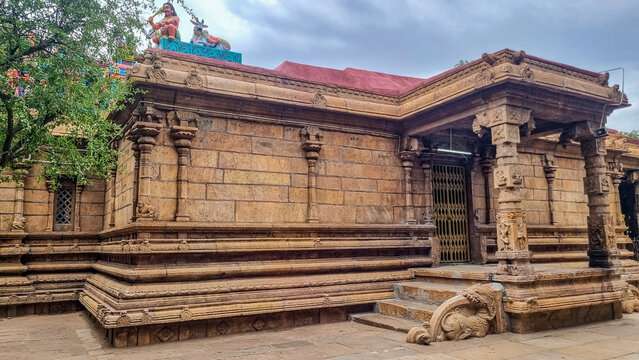 Madurai, Tamil Nadu, India &ndash; August 2, 2026: Exterior view of the shrine at Arulmigu Sri Muktheeswarar Temple, featuring massive granite walls, sculpted pillars, traditional South Indian temple design