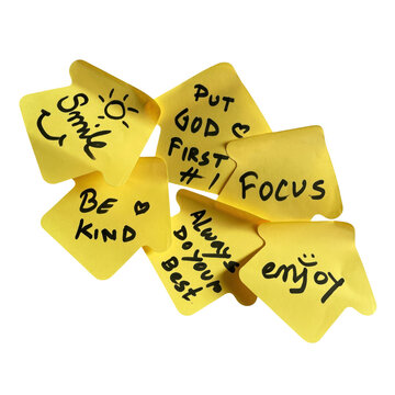 Group of yellow sticky notes with handwritten inspirational messages and positive reminders