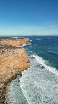 Ethel Beach, Dhilba Guuranda-Innes National Park, South Australia &ndash; 4K aerial drone view of sandy beach, dramatic limestone cliffs, turquoise ocean and rugged Yorke Peninsula coastline
