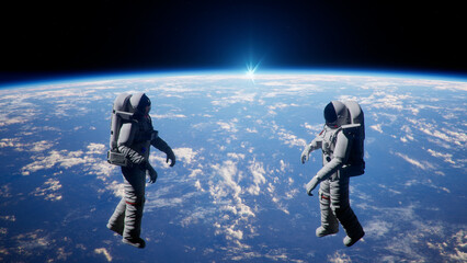  Astronauts Floating in Zero Gravity Above Planet Earth Horizon Mission with Bright Sun Flare Over Earth Atmosphere. © SohubProduction