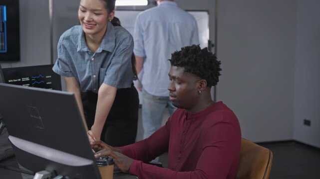 Female developer guides male colleague through collaborative research and development project, demonstrating educational mentorship and knowledge transfer in AI-assisted learning environment.