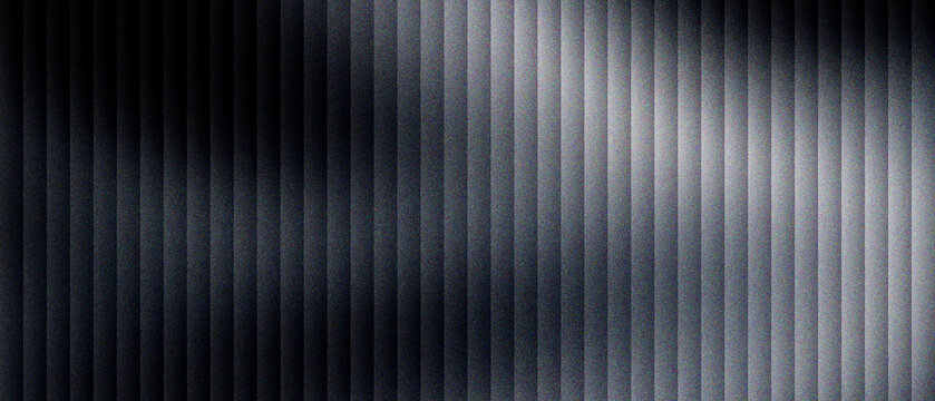 Industrial corrugated metal texture with vertical lines and dramatic lighting. Dark metallic background with silver highlights. Abstract steel surface for architectural and automotive design.