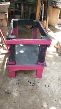 Painted Recycled Wooden Frame Structure in Pink and Black Colors