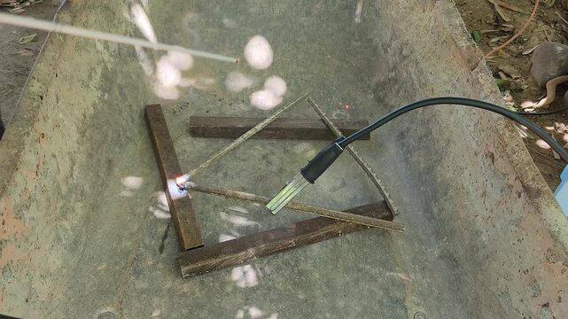 Welding Iron Rebar Pieces to Form Heavy Duty Metal Triangle