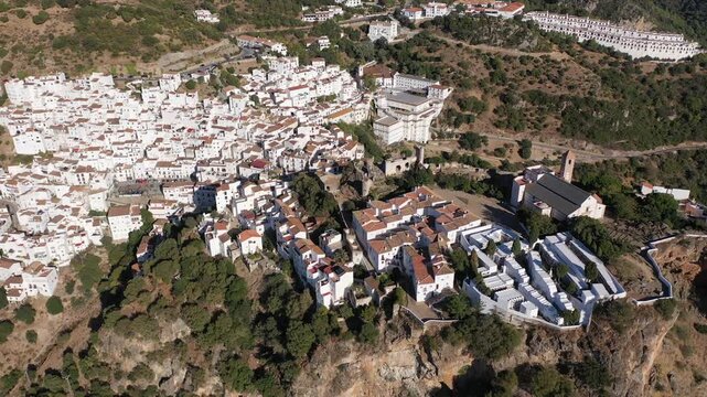 Drone photo of Casares, town in Malga province of Spain. View of buildings on cliffs.