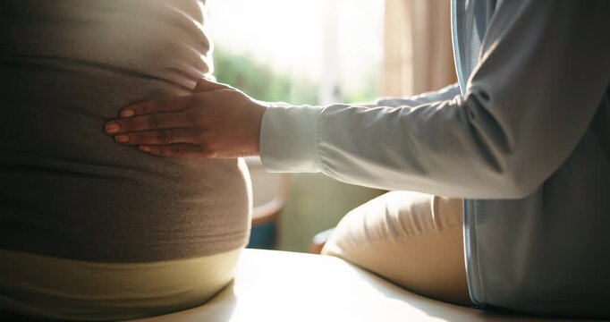 Hands, massage and person with back pain for physiotherapy, assessment and stiffness for recovery. Physiotherapist, patient and physio in office for checkup, muscle injury and rehabilitation progress